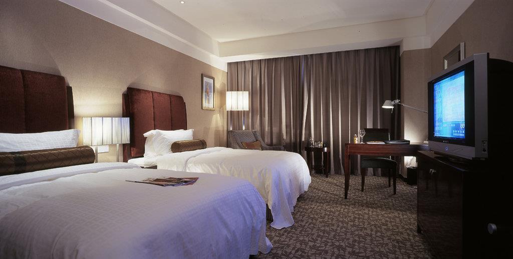 Ruiwan New Century Hotel Tianjin Zimmer foto